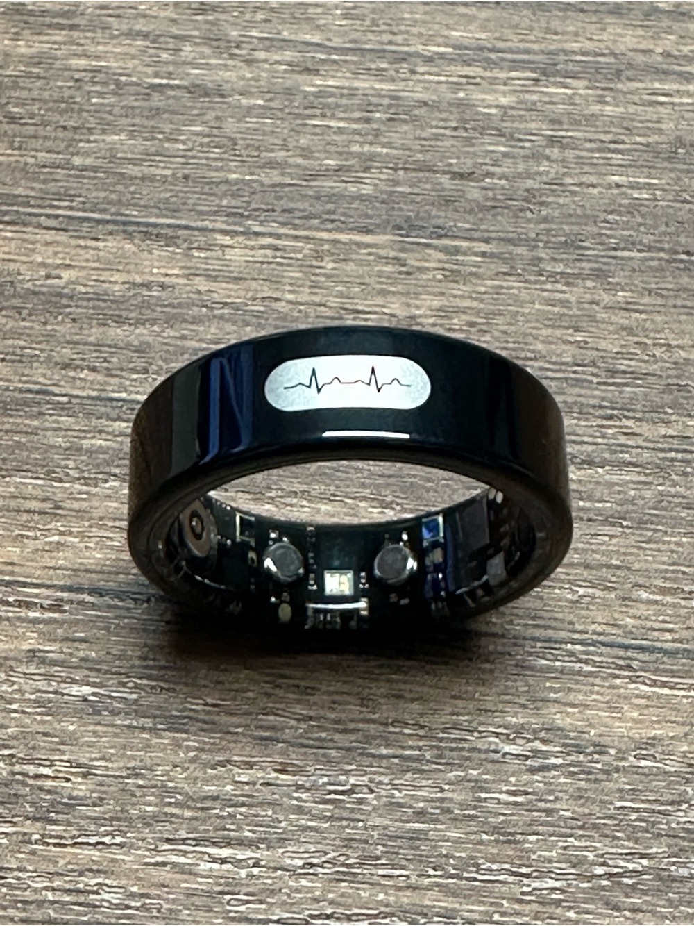 Black Smart Health Ring with Heartbeat Icon